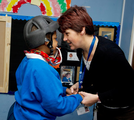 Teacher looking in to the eyes of
a boy