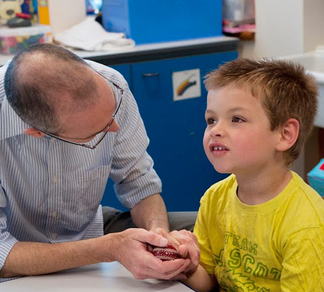 Little boy with teacher