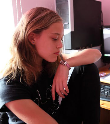 a teenage girl in her bedroom