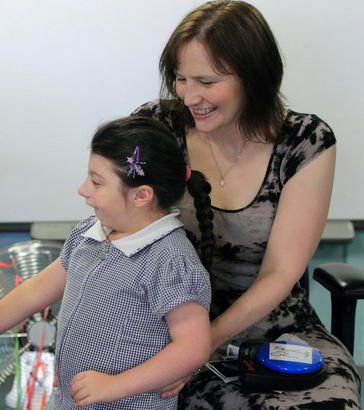 Girl with two carers