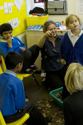 Adults and children participating in a
                  call and response group