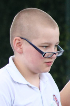 Boy in wheelchair participating in group
activity