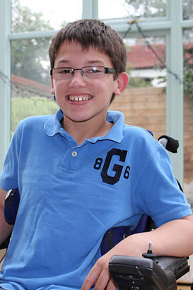 Smiling boy in wheelchair