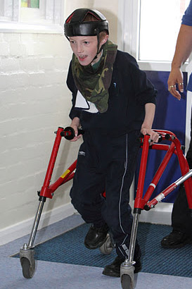 Boy with walking support