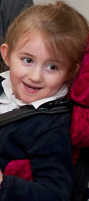 Smiling girl in wheelchair