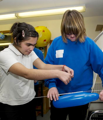 A balloon rocket experiment in
                  progress