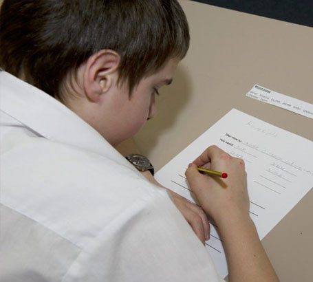 A boy writing