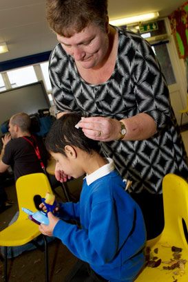 teacher with a deaf boy