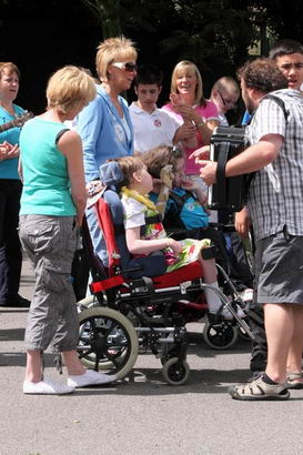 A large group enjoys musical interaction