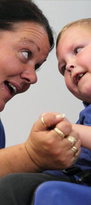 A visually impaired pupil with her teacher