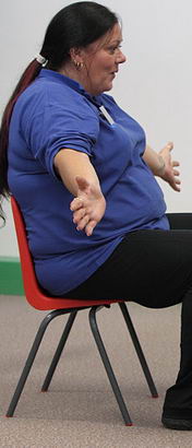 A boy participates in an intensive interaction
                  session