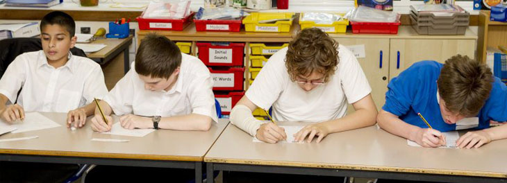 Two members of staff evaluate their assessment
policy
