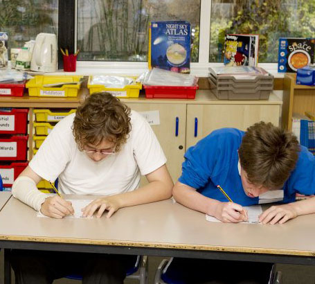 Two members of staff evaluate their assessment
policy