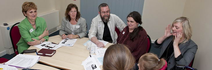 A large multidisciplinary team
                  meets with the child in their care