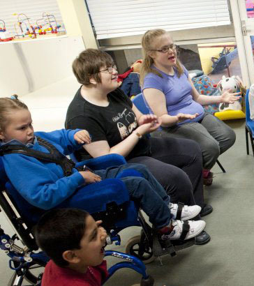 Group of children listening.