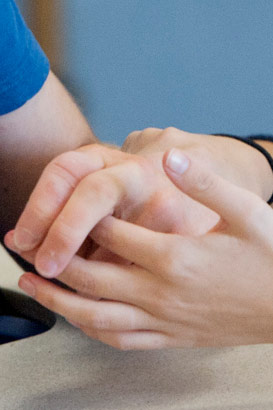 Detail showing Mark and Sara are
                  holding hands