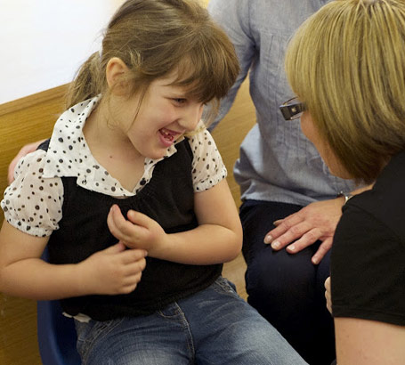 Teacher with little girl