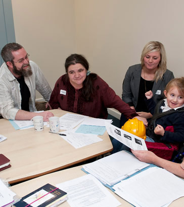 Review meeting of a disabled girl.