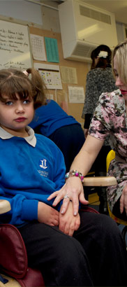 A girl in a specialist chair