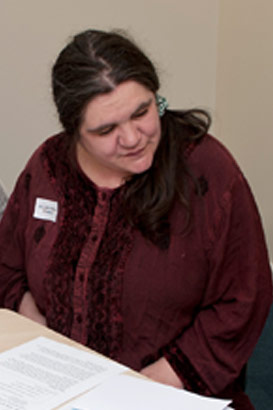 A mother attending a review meeting