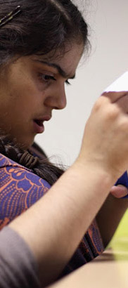 Girl looking at a paper