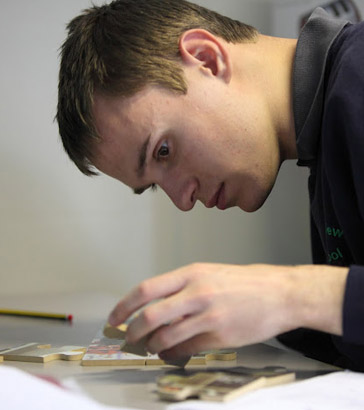 Pupil doing a puzzle