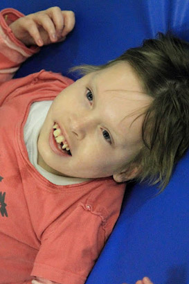 Girl on trampoline.