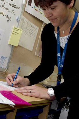 staff working together at computer