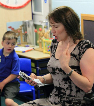 teacher working with small group